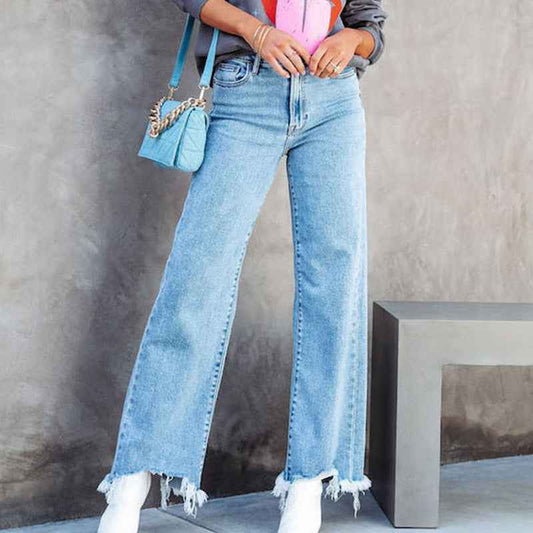 5 Façons d'Adopter les Pantalons à Franges dans un Look Parisien avec Bijoux Minimalistes Femme et Sac à Main Chic - parlezmode.com