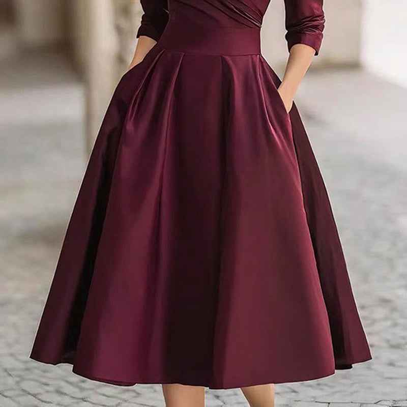 Robe mi - longue élégante pour femme à col en V croisé, jupe évasée et poches — tenue chic de printemps/été - parlezmode.com