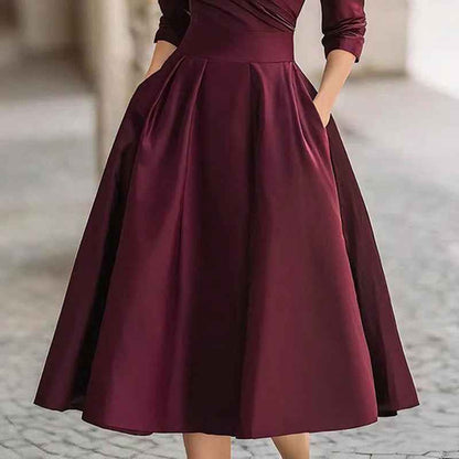 Robe mi - longue élégante pour femme à col en V croisé, jupe évasée et poches — tenue chic de printemps/été - parlezmode.com