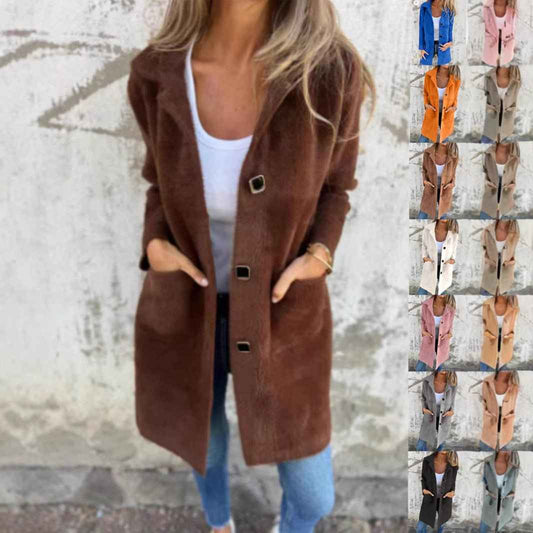 Manteau mi-long à poches et col polo à simple boutonnage