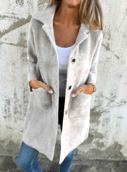 Manteau mi-long à poches et col polo à simple boutonnage